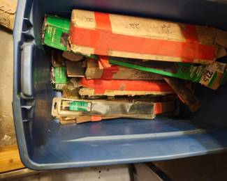 Lots of Lawn mower blades.