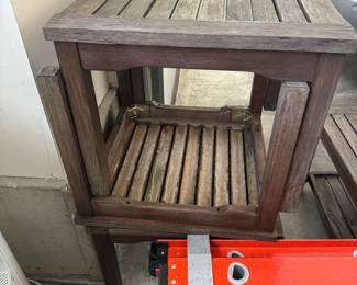 Two outdoor Teak Tables .  Comes with another longer table