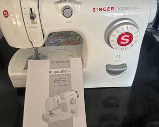 AMOST NEW Singer sewing machine