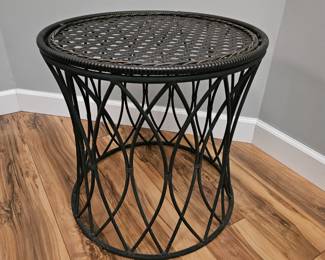 round metal and wicker table