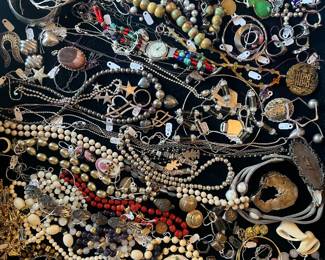 Zoom in to see the jewels! Includes sterling silver, 18k, 14k gold