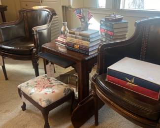 Pair of carved armchairs in leather, very handsome