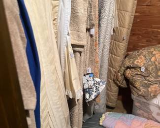 Lots of linens, tree skirts and comforters in the upstairs cedar closet