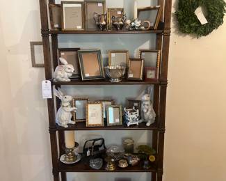 Beautiful wooden shelf with lots of trinkets to look at