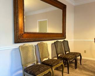 Massive gilded, beveled mirror
88"x53"
4 French chairs 