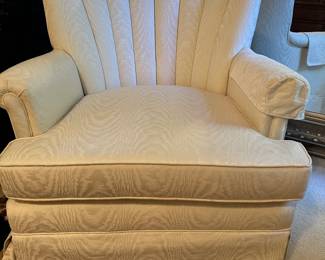 Scalloped fan-back club chairs 