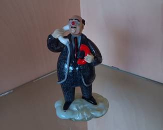 Porcelain Figure On Phone