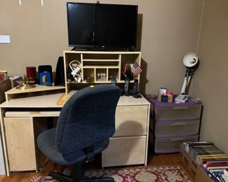 Desk, office chair, books