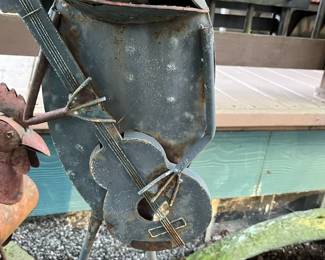 Metal Sculpture of Frog Playing Guitar