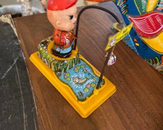 Yone 1950's Tin Wind Up Fishing Boy Toy