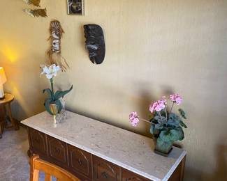 Marble top lowboy cabinet.