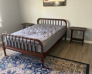 Full size bed and mattress.