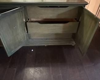 Inside dresser cabinets are pull-out drawers.