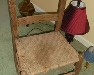 Antique woven seat ladder back chair