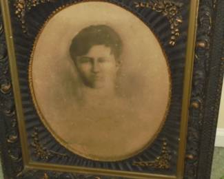 Antique oval frame picture of lady