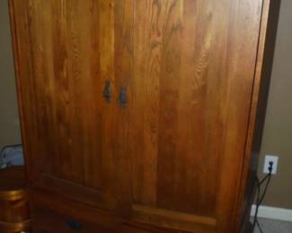 Wood entertainment cabinet w/slide out doors 