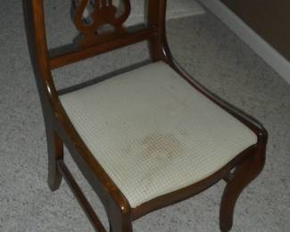 Lyre back wood chair w/metal castors