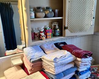 Selection of bath linens & health & beauty items