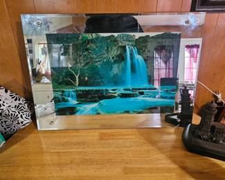 Vintage light up motion waterfall mirror artwork. Sound and lights work