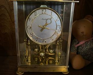 Masler golden table clock.
