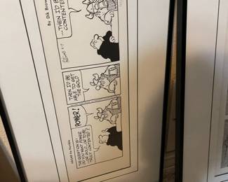 Numerous framed graphic art.