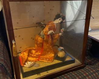Vintage WWII Japanese doll in original cabinet.