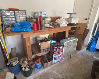Sturdy wooden workbench and tools.
