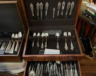 Three sets of silver, including vintage pattern.
