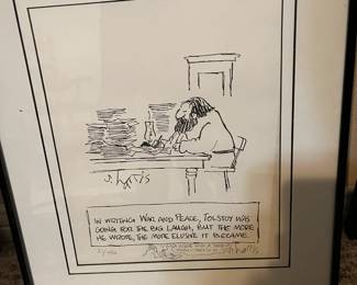 Numerous framed graphic art.