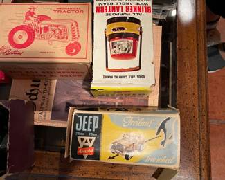 Children's vintage toys: Courtland mechanical tractor new in box, Blinker lantern, Freiland WWII era toy jeep.