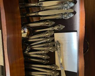 Three sets of silverware.
