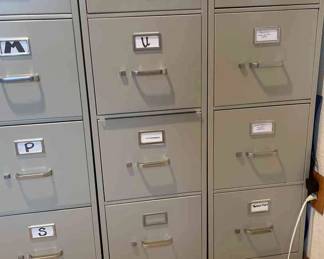 Six Tall Metal Filing Cabinets