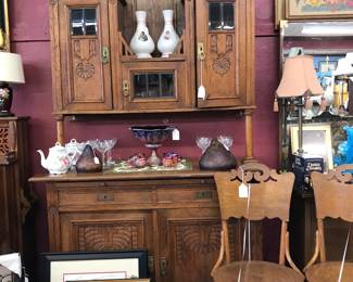 This is a wonderful Oak Buffet/Hutch. Incredible condition.