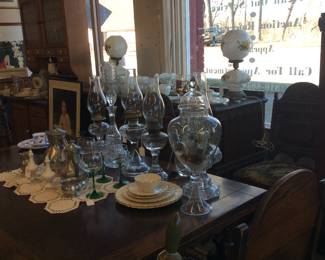 Beautiful tavern style table with leaves that slide out and Buffet to match (heavily carved and 6 chairs.