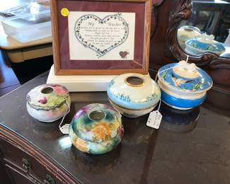 Love these porcelain dresser hair holders and dresser jars