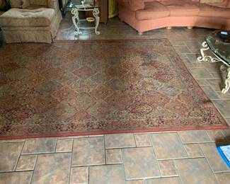 #73	Shaw machine made rug with rust and navy  7x9	 $100.00 
