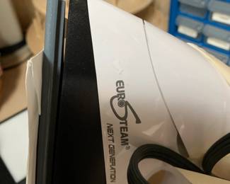 #147	Next Generation Eura steam iron with cd and water bottle 	 $75.00 
