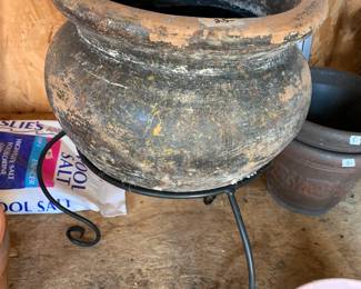 #88	ceramic pot with case iron base 24 tall 	 $75.00 
 
