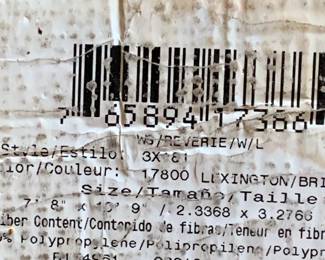 #73	Shaw machine made rug with rust and navy  7x9	 $100.00 
