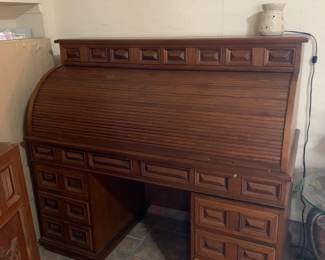 #30	Solid Wood Roll Top Desk - 13 Drawers w/cubbies and marble top. Dovetailed Drawers. 56x25x51 (as pictured chip)	 $500.00 

