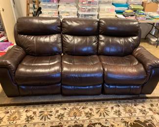 #1	brown leather recliner rocker 3 piece sofa 82 long (1) electric recliner and 1 Manuel	 $500.00 

