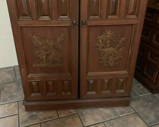 #29	Carved Wood Folding Bar w/Applique Floral Doors. Green Marble Inlay top. 4 Door shelves, w/wine glass hooks. 4 interior drawers, 9 spot wine rack and, 2 shelves. 35-62x18x40	 $800.00 
