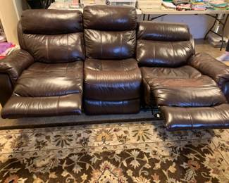 #1	brown leather recliner rocker 3 piece sofa 82 long (1) electric recliner and 1 Manuel	 $500.00 
