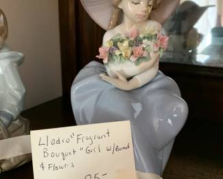 #114	Lladro Fragrant Bouquet Girl w bornet and flowers 	 $75.00 
