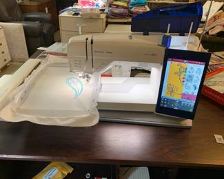 #198	Husqvarna Viking Designer Epic Sewing and Embroidery Machine w/all included Attachments including the largest hoop on the market approx 10x14 with User manuals, Extra feet, extra hoops , walking foot, bobbins, cords and much more.  In excellent condition and working order.  	 $3,000.00 
