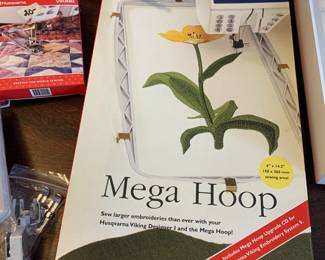 #198	Husqvarna Viking Designer Epic Sewing and Embroidery Machine w/all included Attachments including the largest hoop on the market approx 10x14 with User manuals, Extra feet, extra hoops , walking foot, bobbins, cords and much more.  In excellent condition and working order.  	 $3,000.00 
