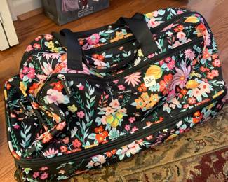 #107	rolling duffle bag by Vera Bradley flower 	 $30.00 
