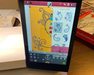 #198	Husqvarna Viking Designer Epic Sewing and Embroidery Machine w/all included Attachments including the largest hoop on the market approx 10x14 with User manuals, Extra feet, extra hoops , walking foot, bobbins, cords and much more.  In excellent condition and working order.  	 $3,000.00 
