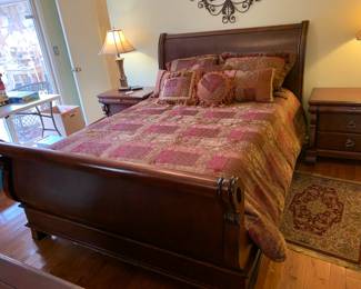 #52	Queen Size Sleigh Platform Bed (as is finish on right side board) 66x84x53	 $250.00 
