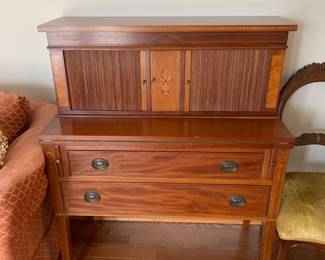 #12	Antique Writing Desk w/burl inlay wood, flip top velvet surface, roll back doors. 36x17.5-24x44	 $275.00 
